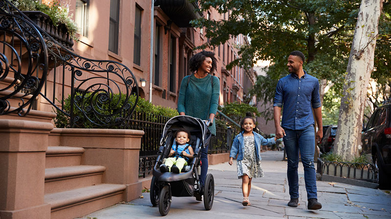 Parents with kids and stroller