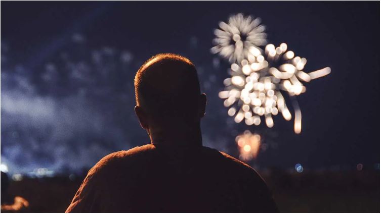 Man watching fireworks